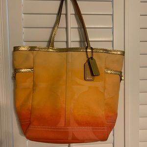 Coach orange/gold shoulder tote with C pattern